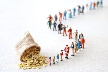Diorama of people waiting in line for food aid