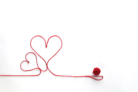 Heart shape drawn with red thread