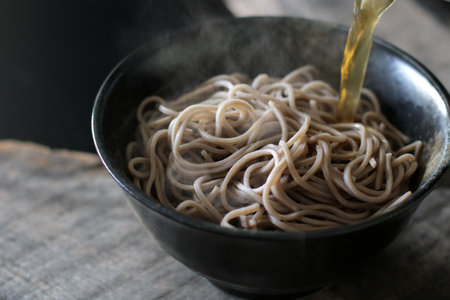 Warm soba noodles with steamの写真素材