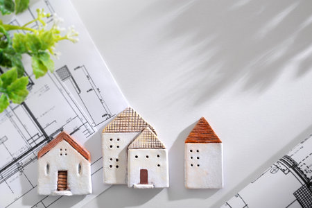 Image of a model of a house and a blueprint of my homeの写真素材