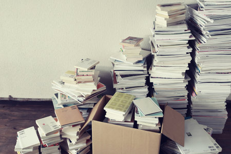 Disposal and decluttering of a large number of books, magazines and paperbacksの写真素材