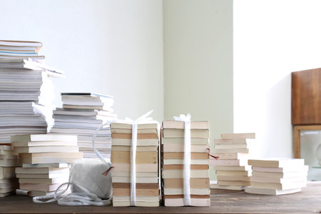 Disposal and decluttering of a large number of books, magazines and paperbacksの写真素材