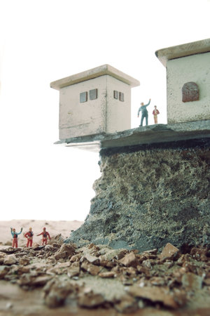 A house on the verge of collapse due to a landslideの写真素材