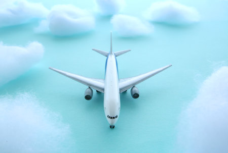 Airplanes and clouds flying in the blue skyの写真素材