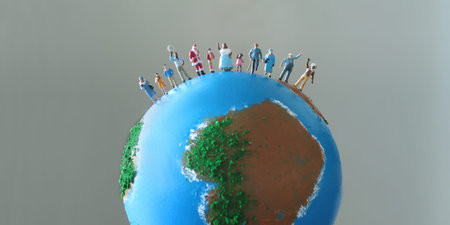 Globes and miniature dolls with the image of the earth where people from all over the world gathered