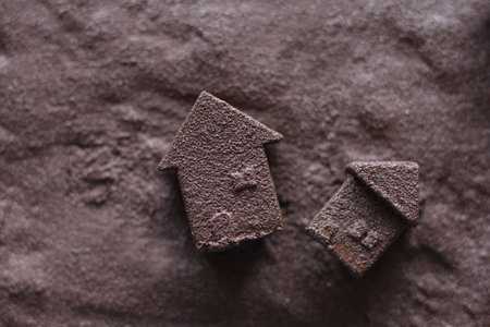 The wreckage of a house swept away by a mudslide from a natural disasterの写真素材