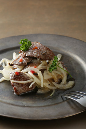 Beef steak served on a plateの写真素材