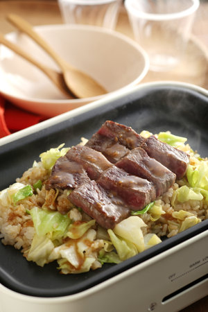 Delicious diced steak served on a plateの写真素材