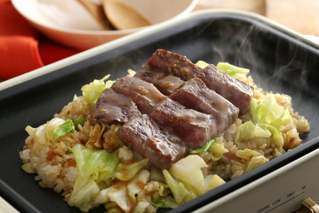 Delicious diced steak served on a plateの写真素材