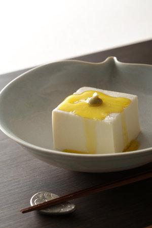 Tofu dish and cold tofu in a bowlの写真素材