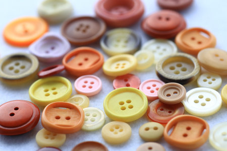 Group photo of colorful buttons used in dressmaking