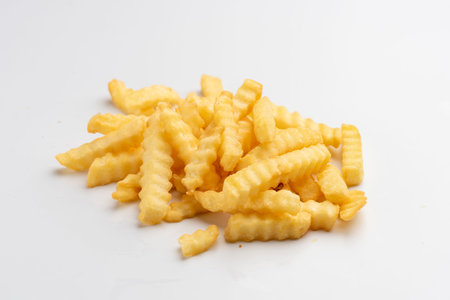 crinkle fries on white background portion os fries potato menu isolated