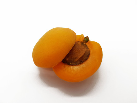 Fresh apricots isolated on a white backgroundの写真素材