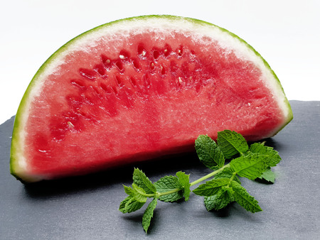 Juicy melon isolated on white backgroundの写真素材