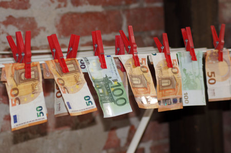 Money laundering euro bills on the clothesline
