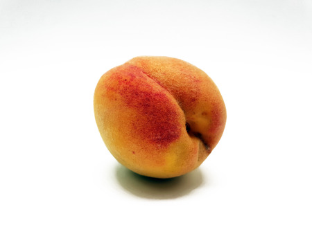 Fresh peaches isolated on white backgroundの写真素材