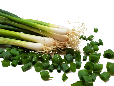 Green onions isolated on white backgroundの写真素材