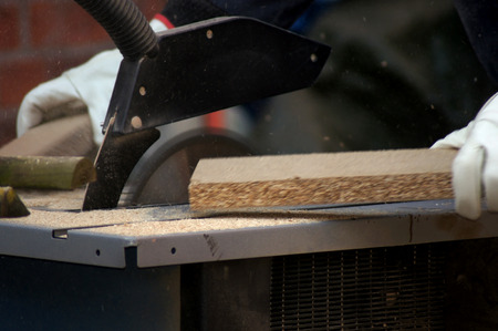 Saw wood with the table sawの写真素材
