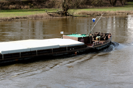 Cargo ship on the Elbe in Dessau Ro?lauの写真素材