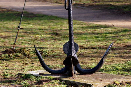 Huge ship anchor on the banks of the Elbe