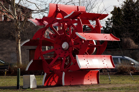 Water wheel of a paddle steamer in redの写真素材