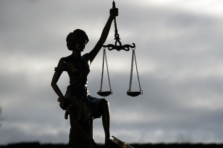 Lady Justice released under the skyの写真素材
