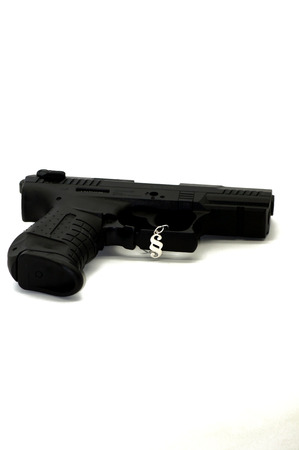 Gun law, gun released on neutral backgroundの写真素材