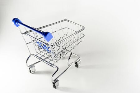 Shopping baskets on a white background. Macro shotの写真素材