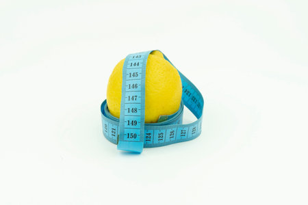 lemon wrapped in blue roulette. Fruit, Slimming, diet isolated on a white