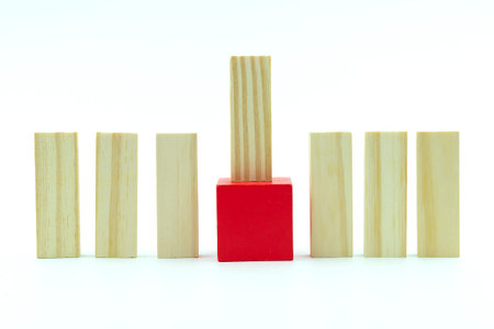 Business concept for leadership, teamwork and success played out on wooden cubes. Series of photos