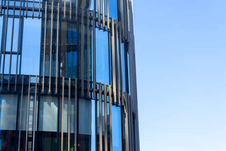 Modern building of a business center against a cloudless sky. Front viewの写真素材