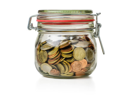 canning jar filled with coins