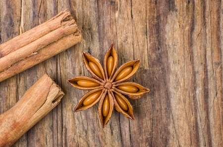 Cinnamon sticks and star anise on a wooden tableの写真素材