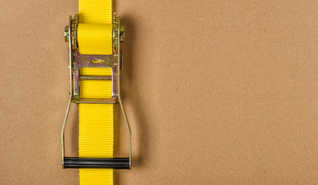 Yellow ratchet strap with copy spaceの写真素材