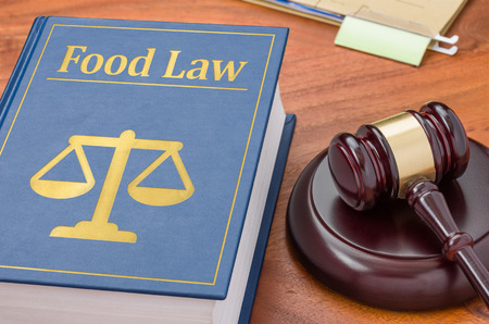 A law book with a gavel - Food lawの写真素材