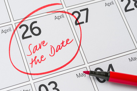 Save the Date written on a calendar - April 26の写真素材