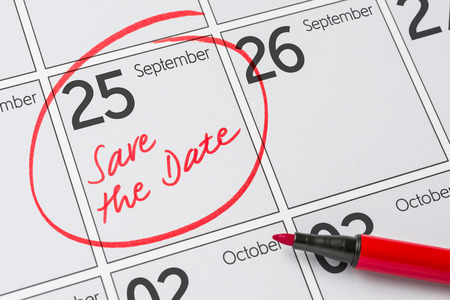 Save the Date written on a calendar - September 25の写真素材