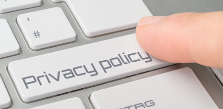 A keyboard with a labeled button - Privacy policy