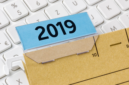A brown file folder labeled with 2019の写真素材