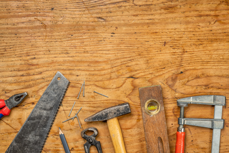 Woodworking tools on a wooden background with copy spaceの写真素材