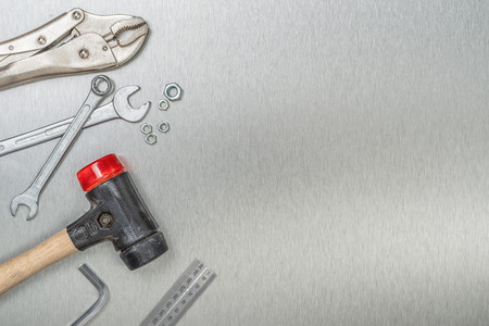 Tools on a metal background with copy spaceの写真素材