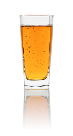 A glass with iced tea on a white backgroundの写真素材