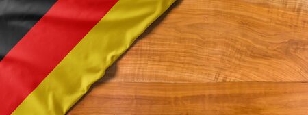 National flag of Germany on a wooden background with copy spaceの写真素材