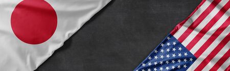 Flags of Japan and the United States of America with copy spaceの写真素材
