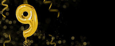 Golden balloons with copy space - Number 9の写真素材