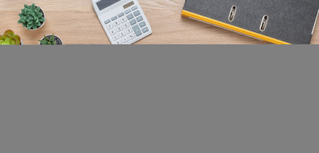 A newspaper on a desk with the headline Annual review 2023の写真素材