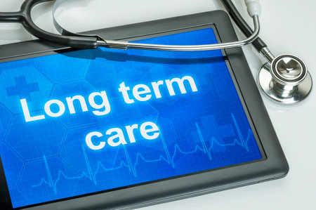 Tablet with the text Long term care on the displayの写真素材