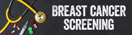 Stethoscope and pharmaceuticals on a blackboard - Breast cancer screeningの写真素材