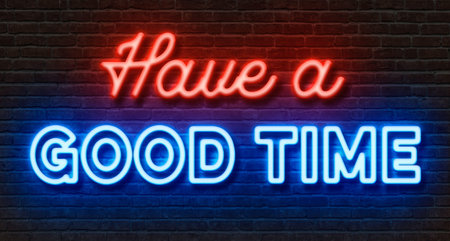 Neon sign on a brick wall - Have a good timeの写真素材