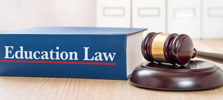A law book with a gavel - Education lawの写真素材